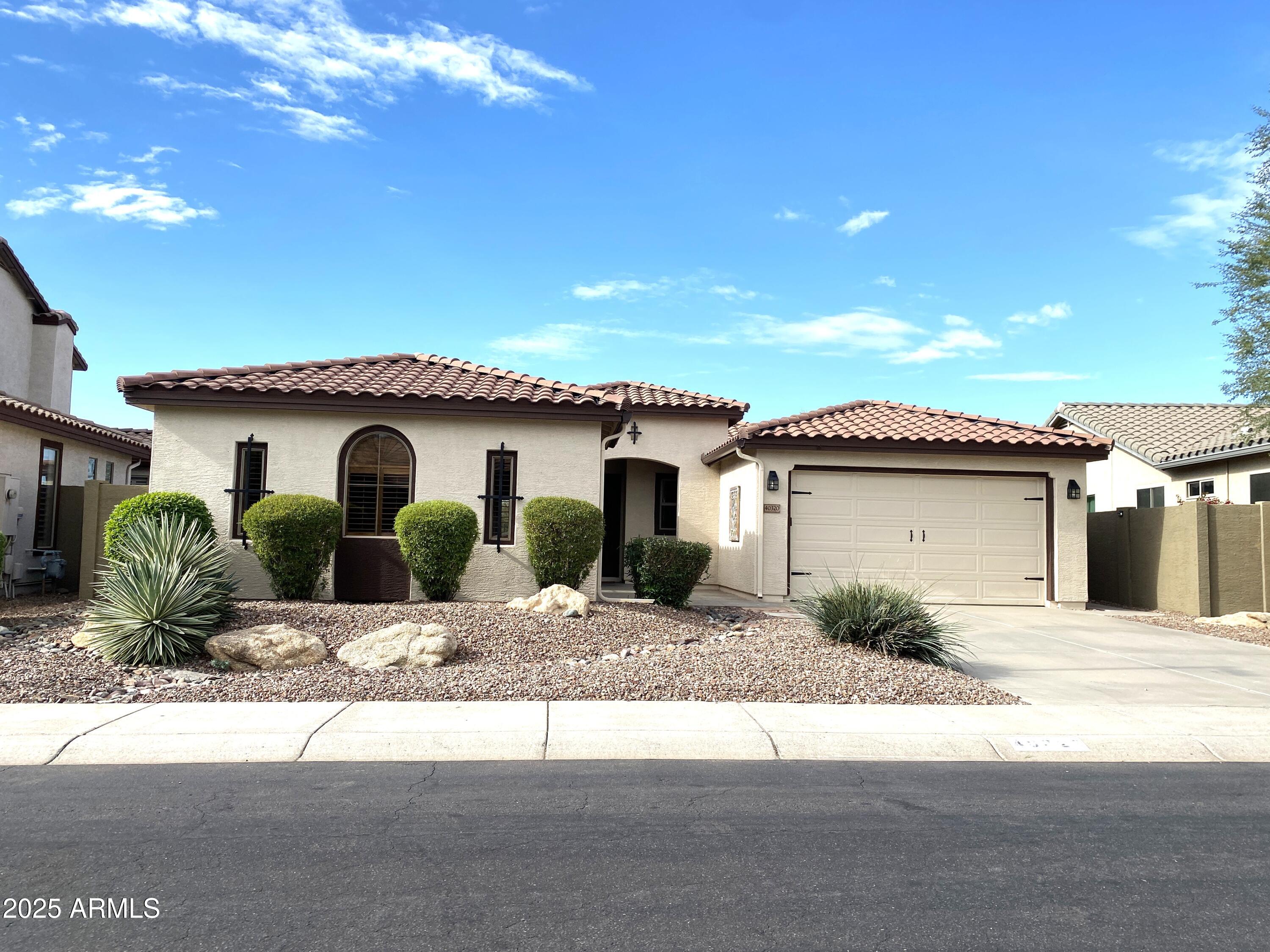 40320 North Exploration Trail Anthem, AZ 85086 - Photo 1 of 33 a view of a house with a outdoor space