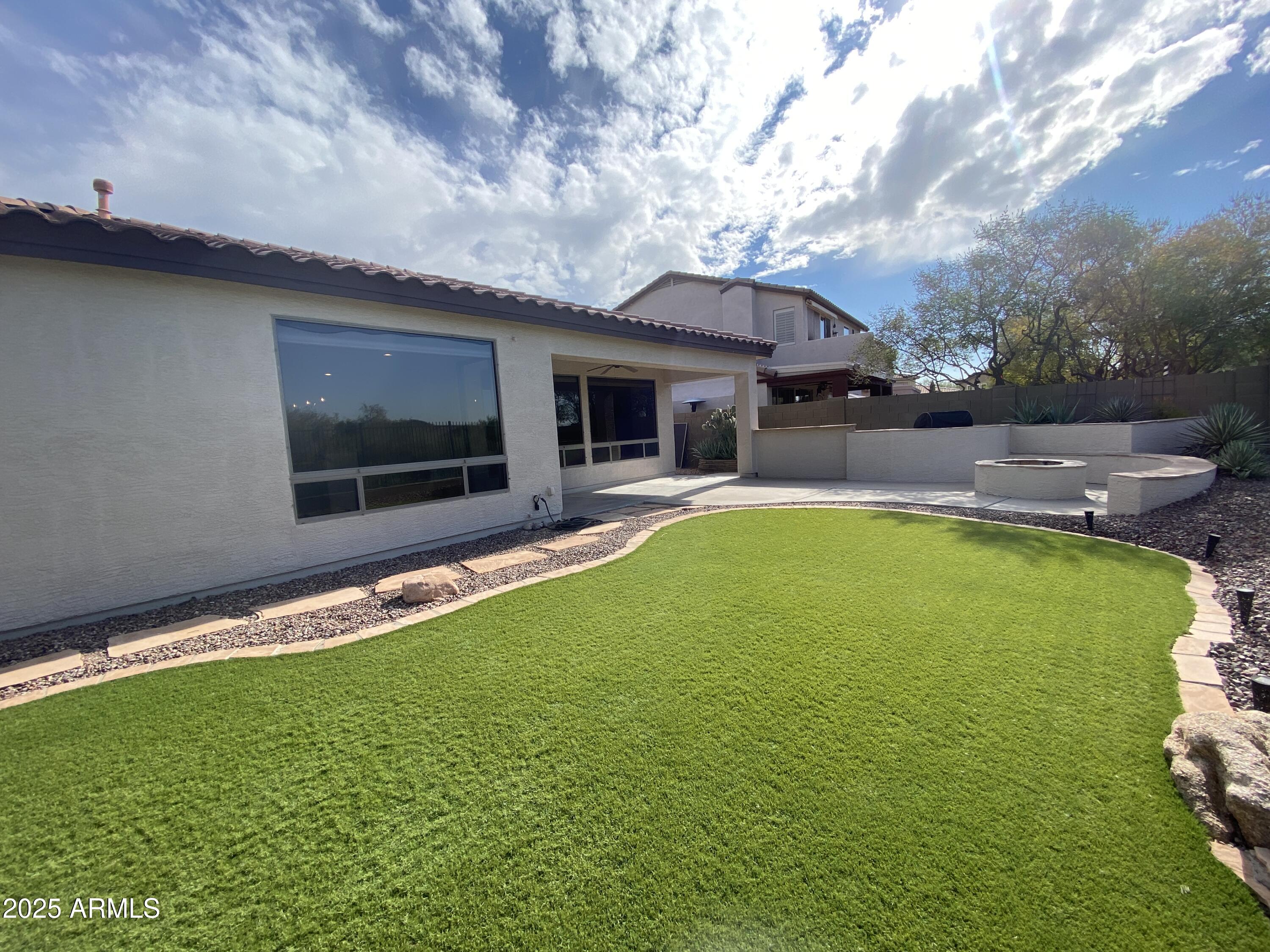 40320 North Exploration Trail Anthem, AZ 85086 - Photo 25 of 33 a view of outdoor space yard and swimming pool