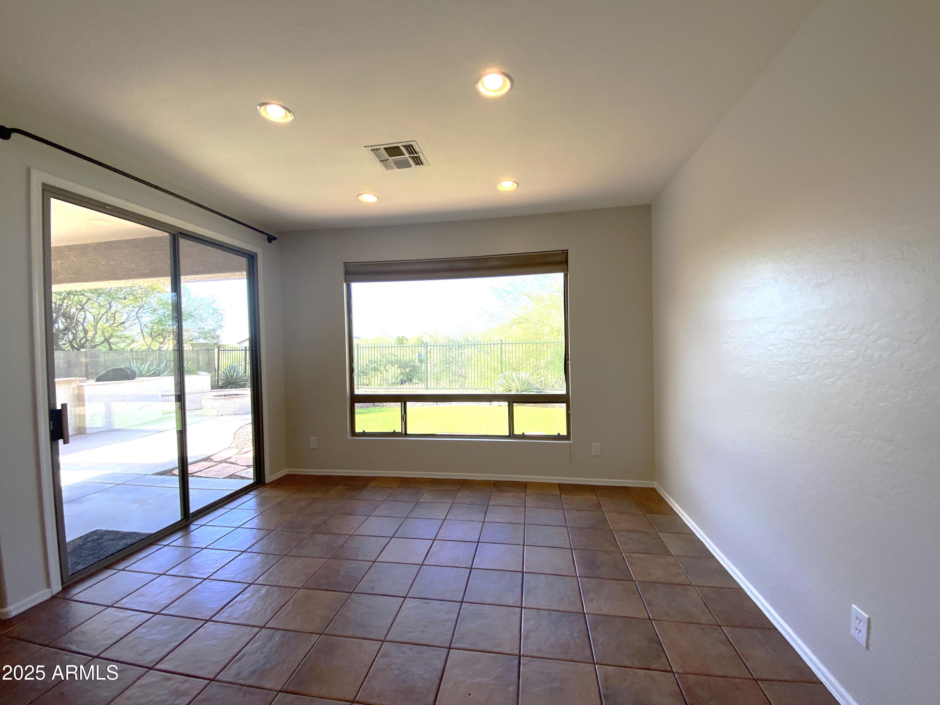 40320 North Exploration Trail Anthem, AZ 85086 - Photo 4 of 33 a view of an empty room and window