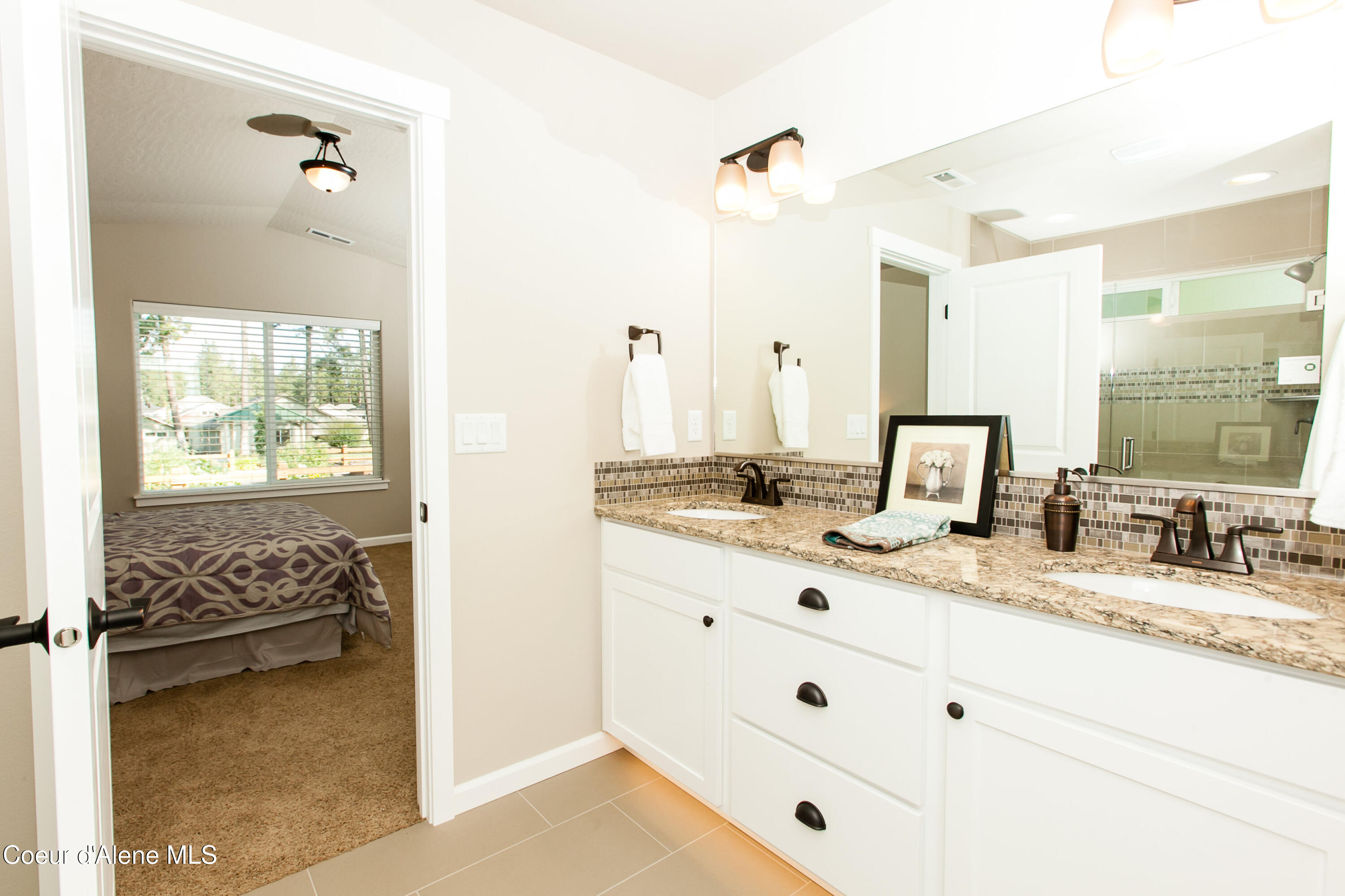 3349 North Segar Loop Post Falls, ID 83854 - Photo 16 of 26 (15) Stock Master Bathroom