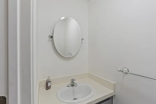 an empty room with closet area