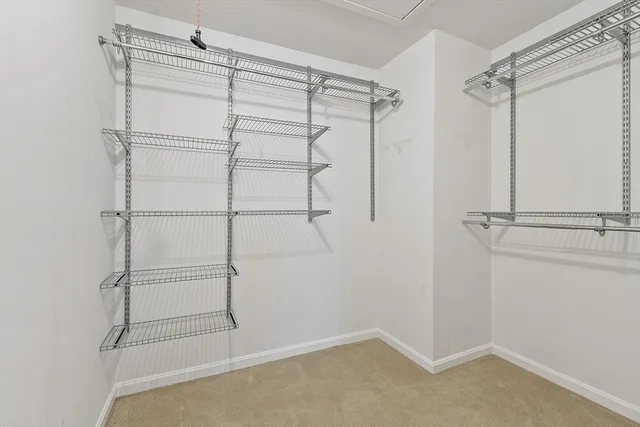 a view of a room that has a window in it