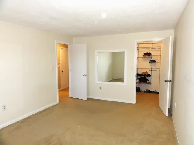 an empty room with closet