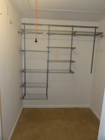 a view of a room with racks on the wall