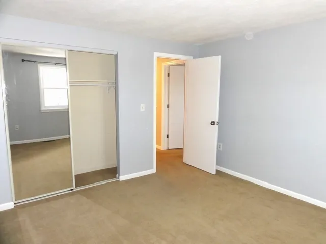 an empty room with closet