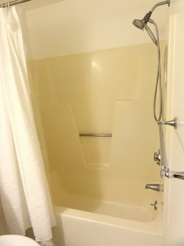 a bathroom with a bathtub