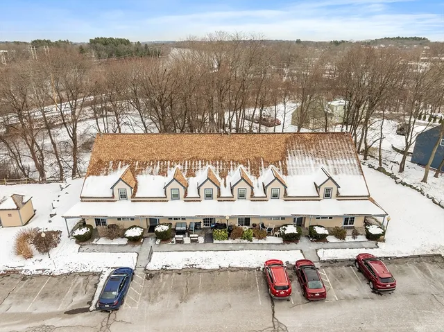 a view of a parking area with trees