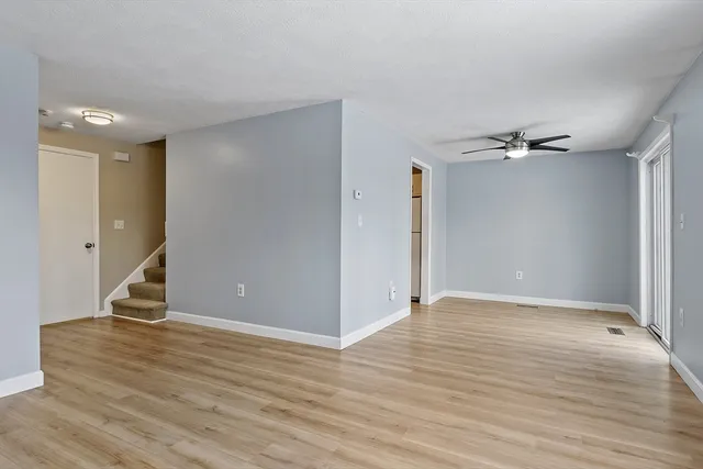 a kitchen with a stove and a cabinet