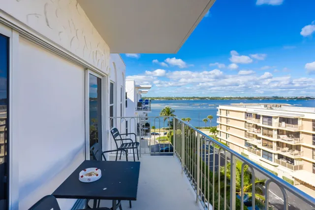 a view of swimming pool with outdoor seating