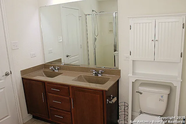 a bathroom with a sink and a toilet