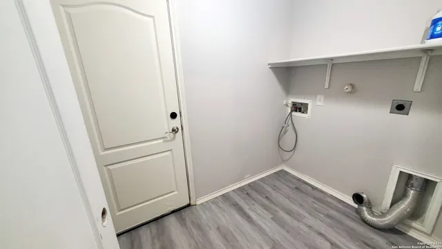 a bathroom with a sink and shower