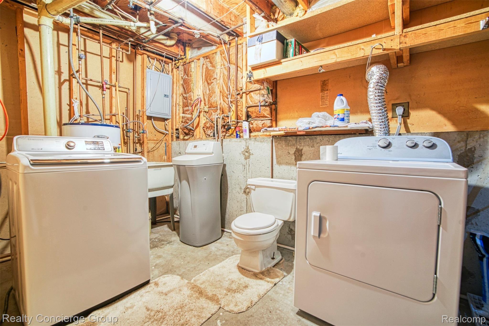 6505 Byron Road Howell, MI 48855 - Photo 14 of 20 Laundry room located on lower level.