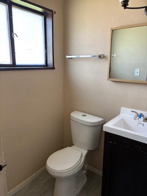 280 Rich Road Park Forest, IL 60466 - Photo 8 of 12 a bathroom with a toilet sink and mirror