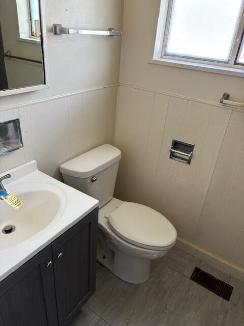 280 Rich Road Park Forest, IL 60466 - Photo 9 of 12 a white toilet sitting next to a bathroom sink