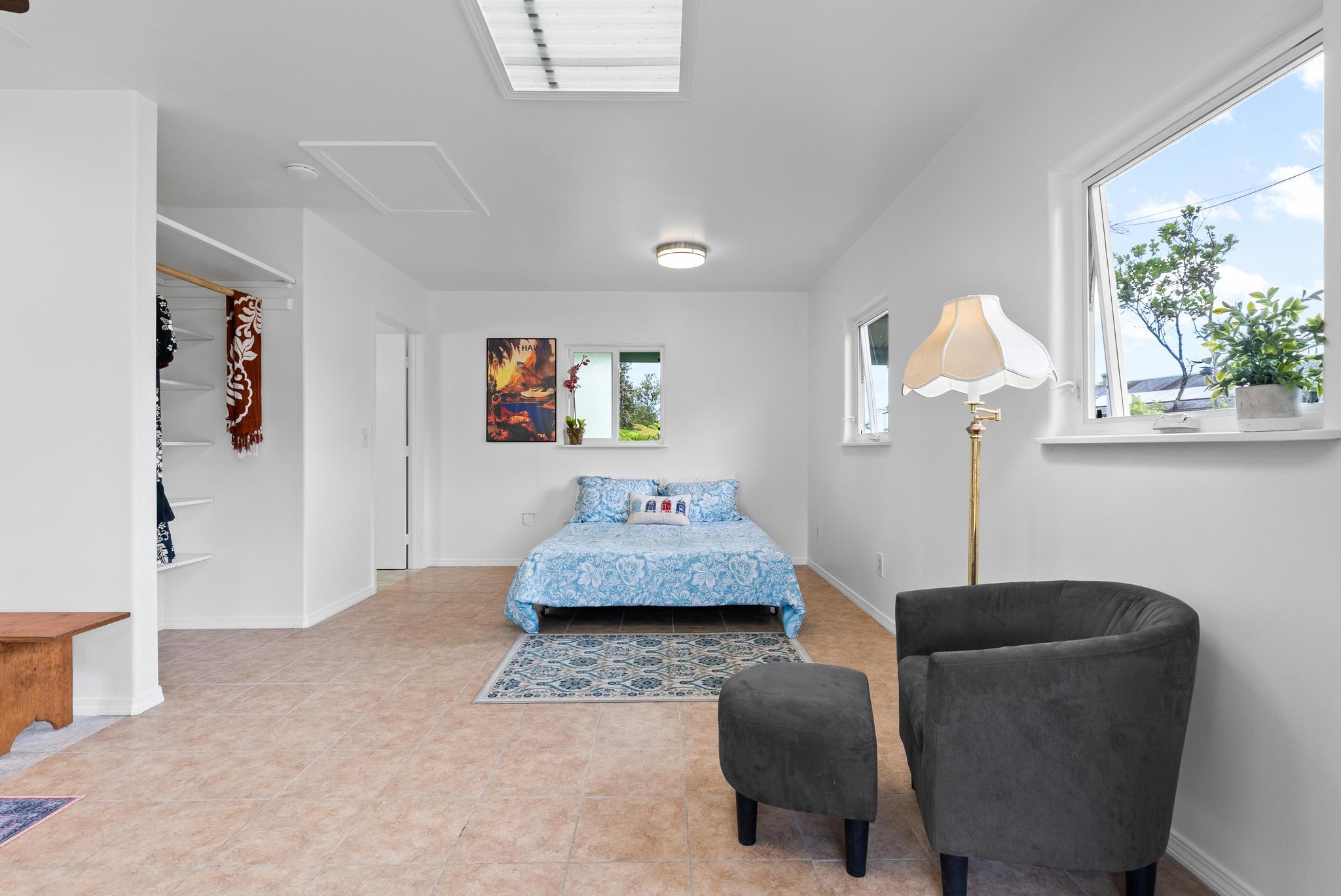 11-2449 Ohialani Road Mountain View, HI 96771 - Photo 6 of 10 a living room with furniture and a potted plant