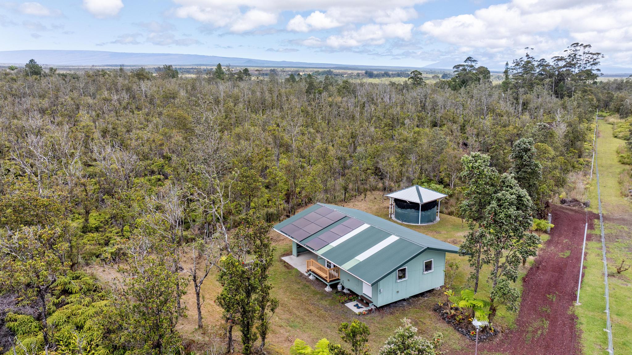 11-2449 Ohialani Road Mountain View, HI 96771 - Photo 9 of 10 a view of a trees in a yard