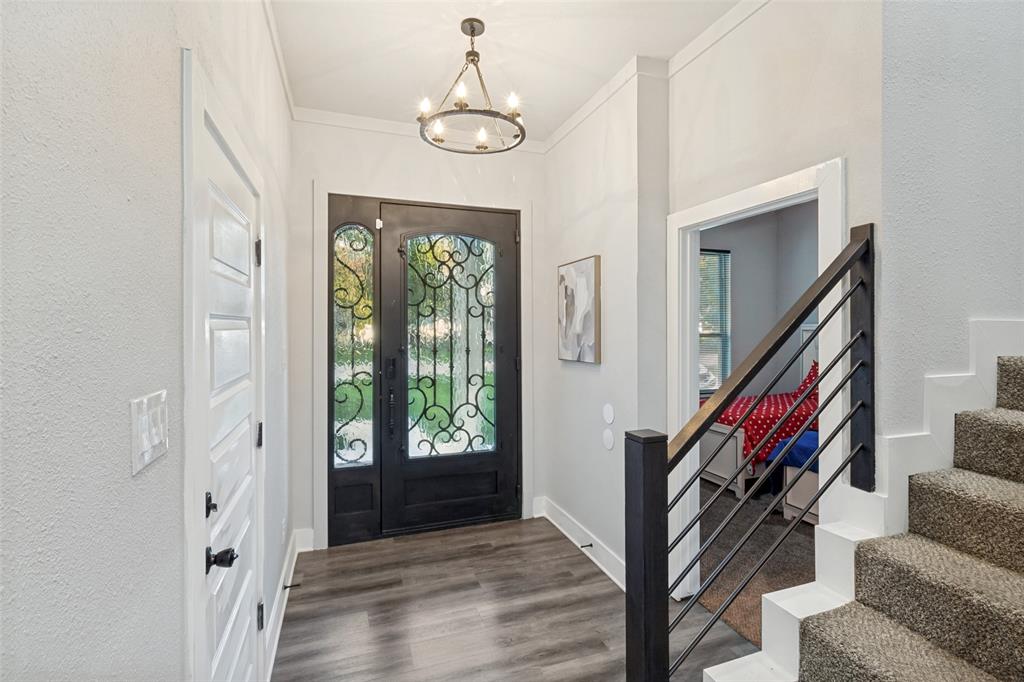 7909 Ivory Lane Dallas, TX 75216 - Photo 3 of 20 a view of an entryway with wooden floor