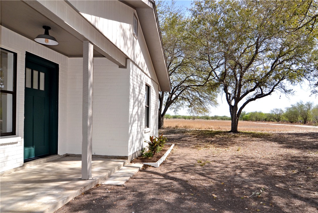 202 Ranch Road Mathis, TX 78368 - Photo 29 of 36 a view of a yard with trees