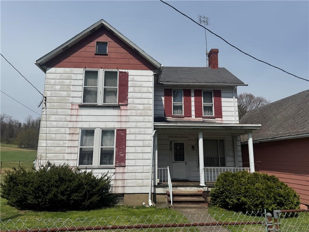797 Walnut Hill Road Uniontown, PA 15401 - Photo 2 of 39 a front view of a house with a yard