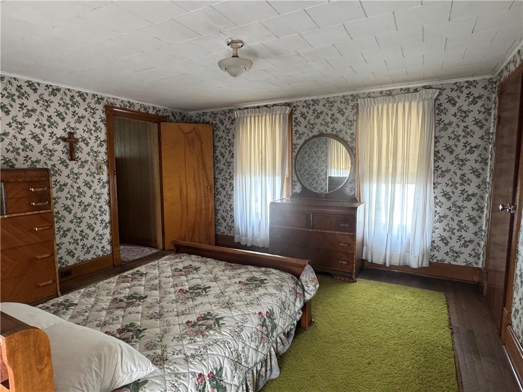 797 Walnut Hill Road Uniontown, PA 15401 - Photo 22 of 39 a bedroom with a bed and a window