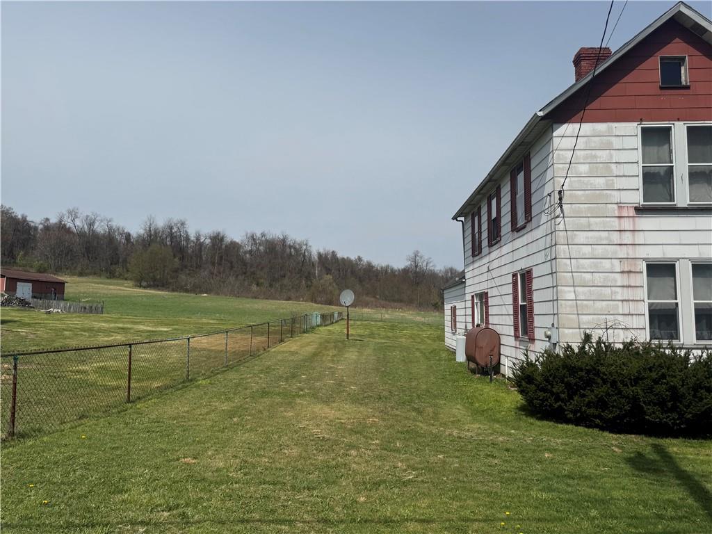 797 Walnut Hill Road Uniontown, PA 15401 - Photo 32 of 39 a view of a house with a yard and a fountain