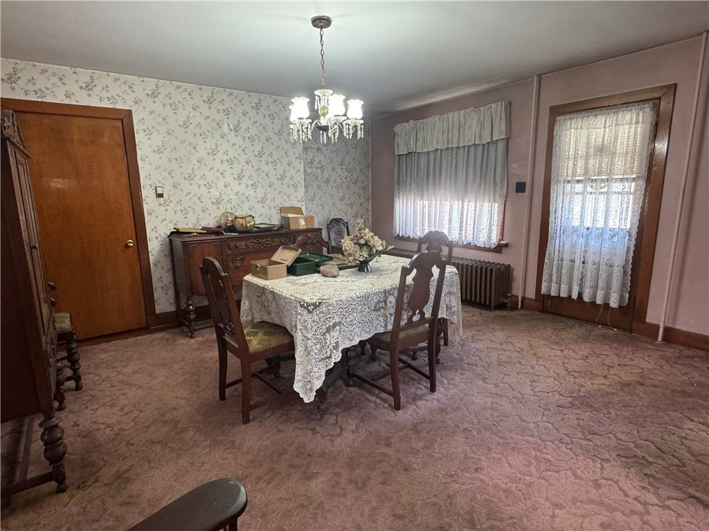 797 Walnut Hill Road Uniontown, PA 15401 - Photo 6 of 39 a view of a dining room with furniture and chandelier