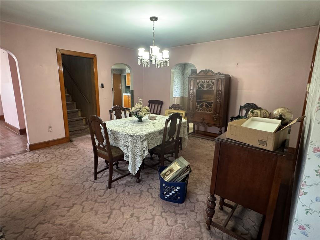 797 Walnut Hill Road Uniontown, PA 15401 - Photo 7 of 39 a dining room with furniture and chandelier