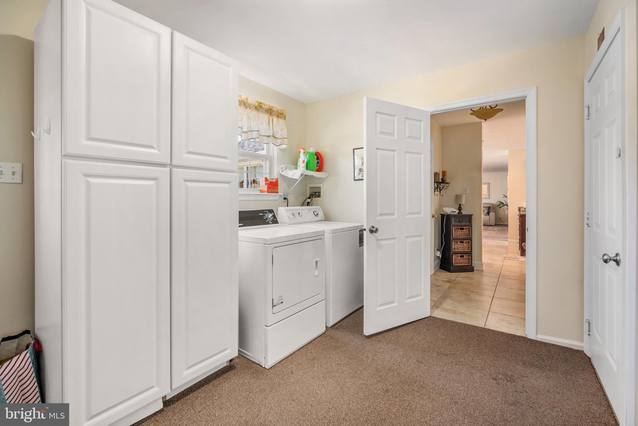 109 Brookside Way Mullica Hill, NJ 08062 - Photo 16 of 41 a view of a storage & utility room with closet dryer and washer