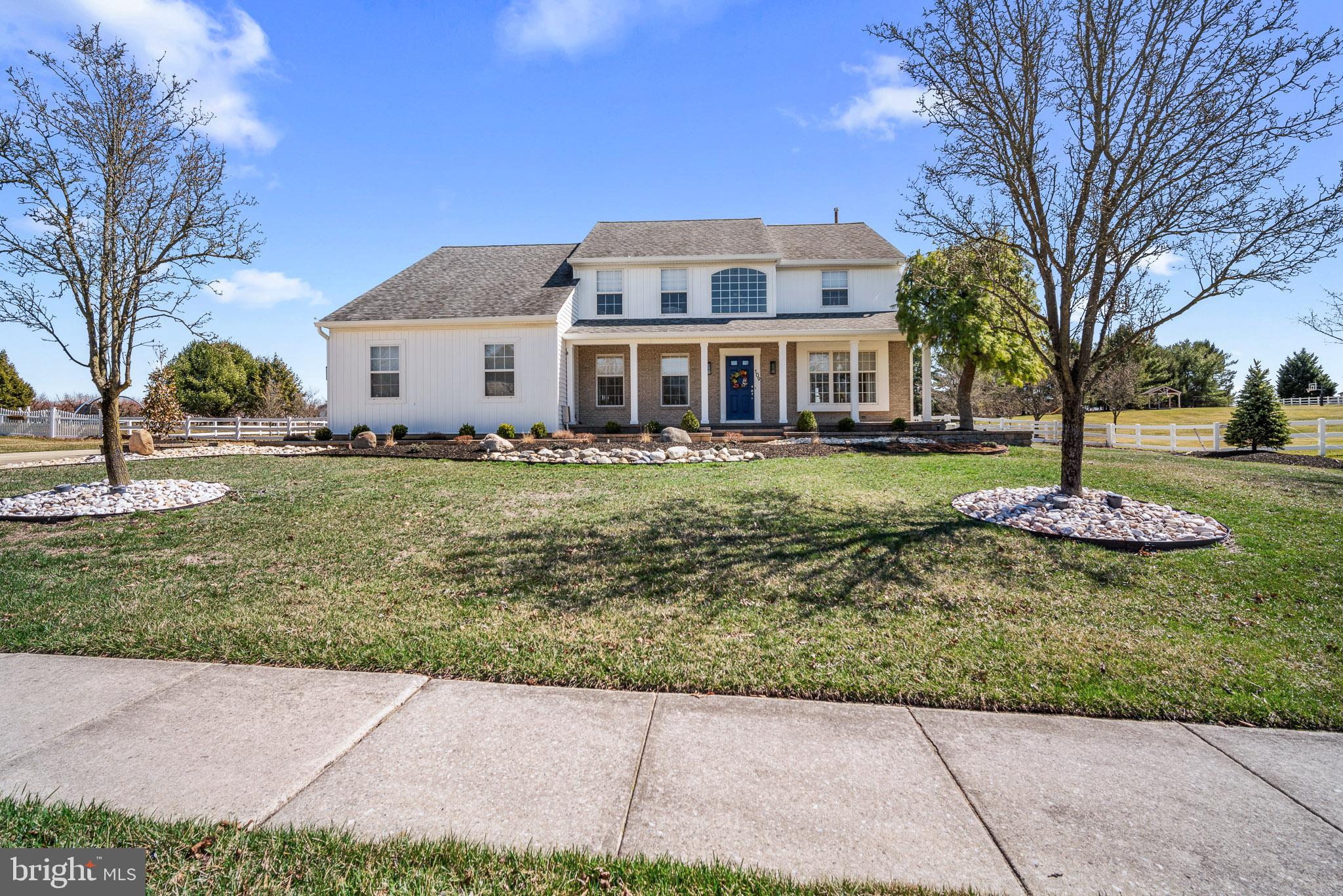 109 Brookside Way Mullica Hill, NJ 08062 - Photo 2 of 41 a front view of a house with a yard