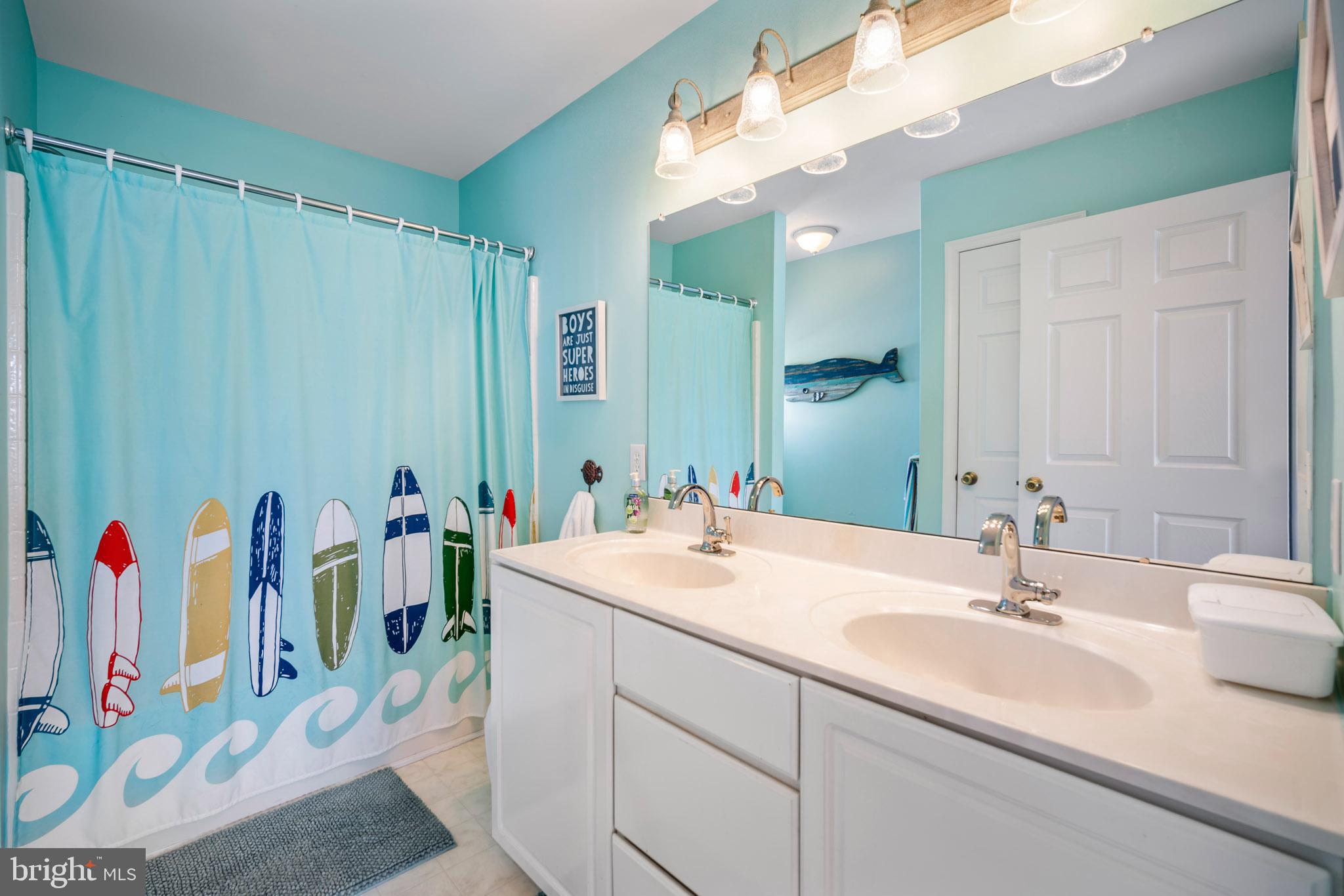 109 Brookside Way Mullica Hill, NJ 08062 - Photo 22 of 41 a bathroom with a sink vanity and a mirror
