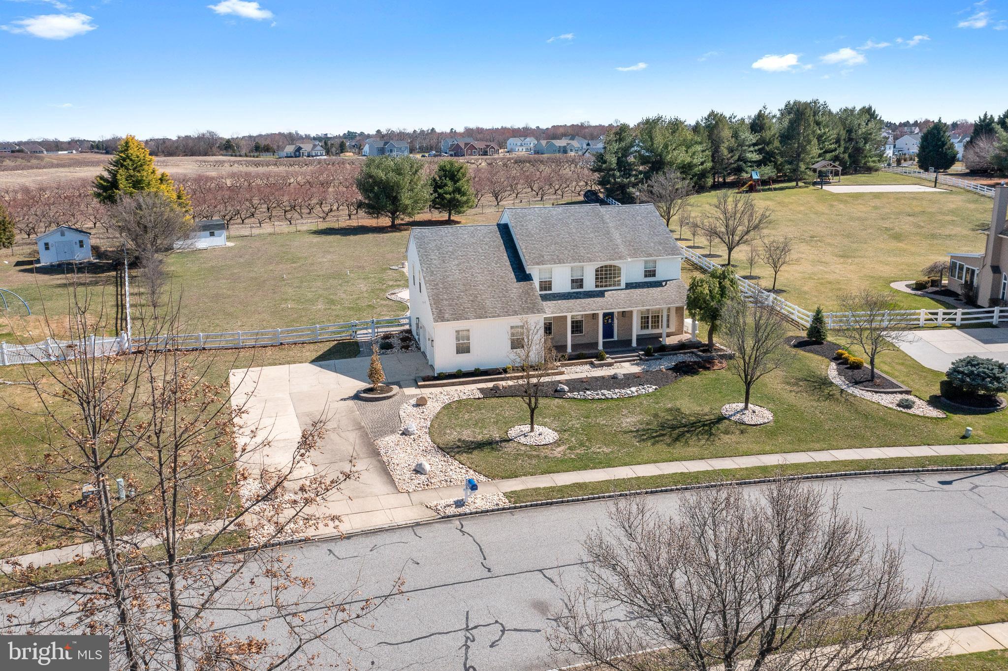 109 Brookside Way Mullica Hill, NJ 08062 - Photo 33 of 41 a view of a lake with a house