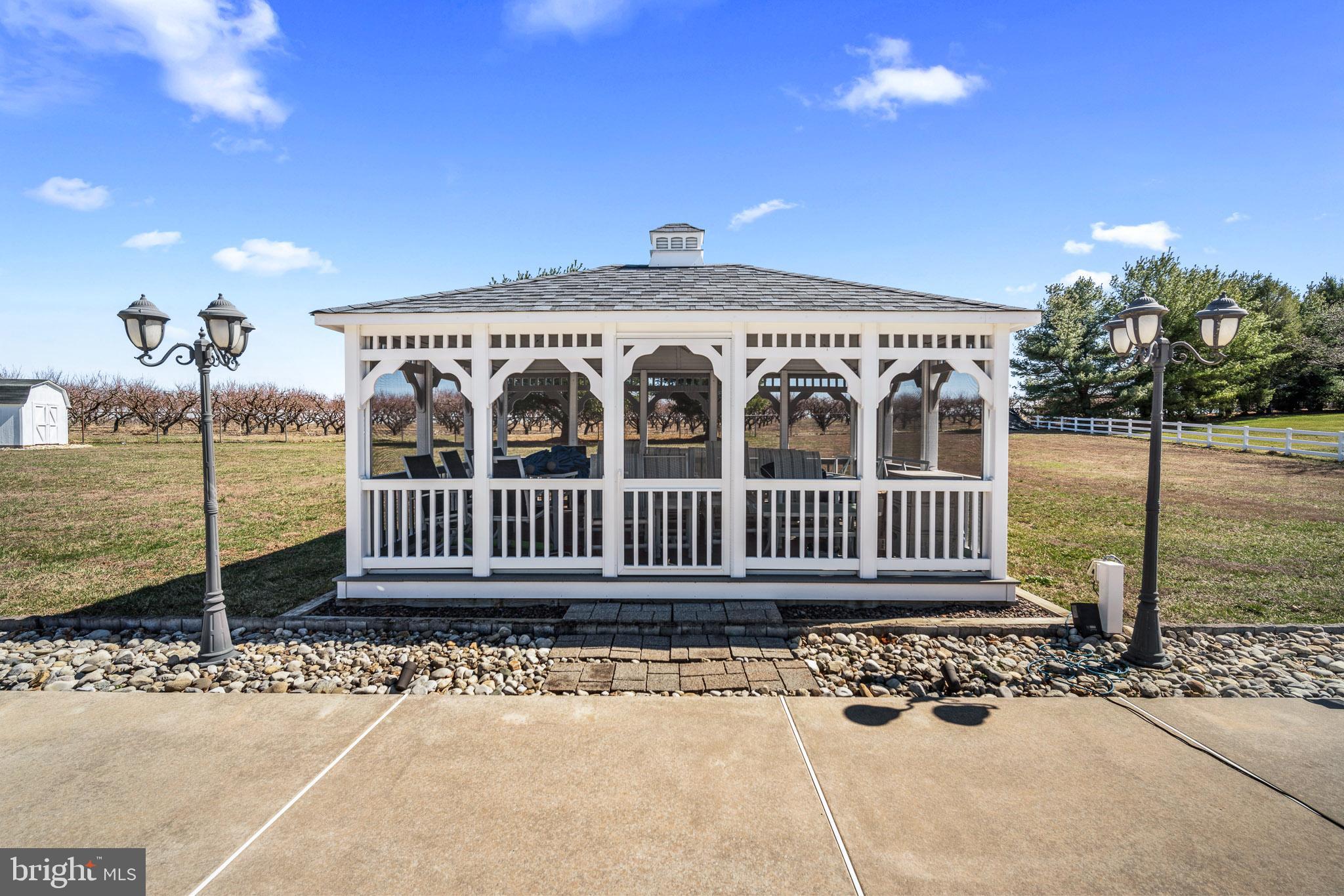 109 Brookside Way Mullica Hill, NJ 08062 - Photo 5 of 41 a view of a house with a deck