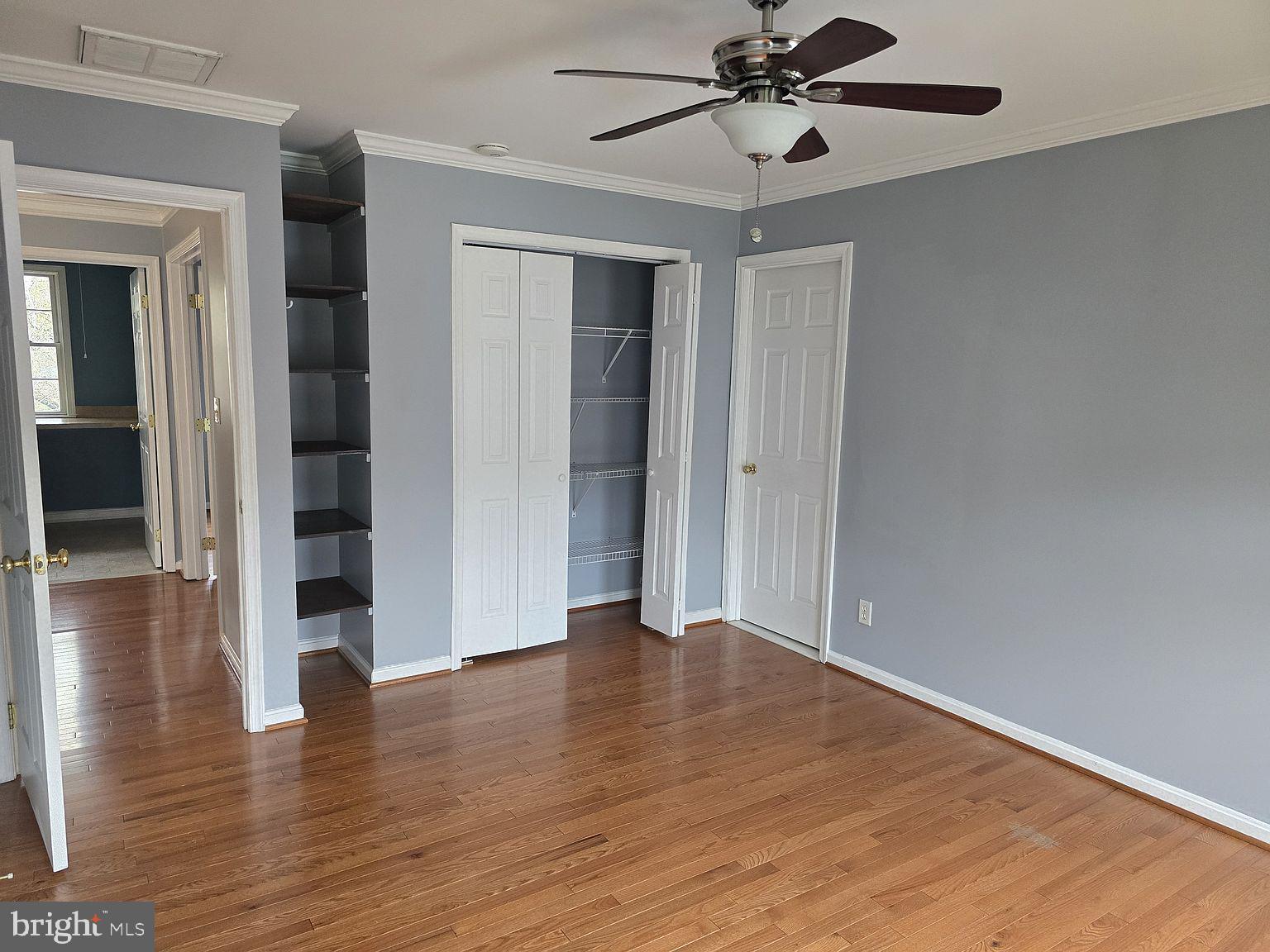 3917 Edith Court Ellicott City, MD 21043 - Photo 15 of 27 a view of an empty room with wooden floor