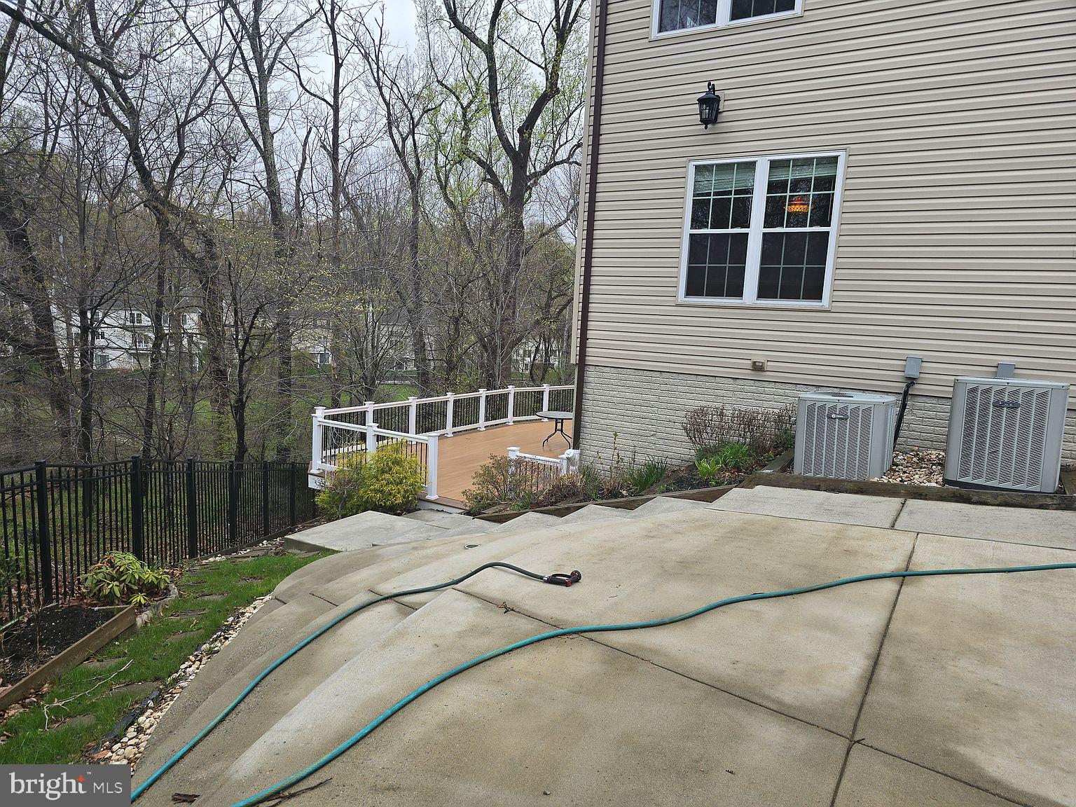 3917 Edith Court Ellicott City, MD 21043 - Photo 24 of 27 a front view of a house with a yard