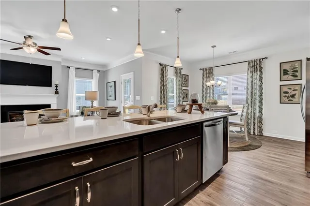 a bedroom with a bed couch and a window