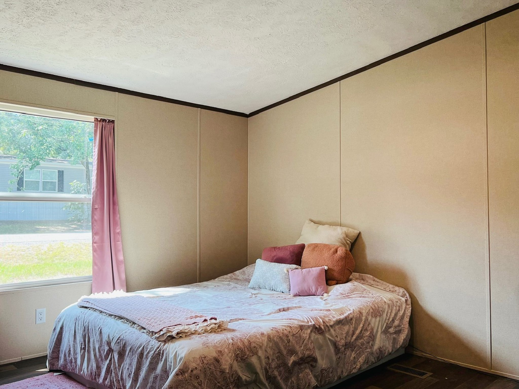 15 Great Oak Trinity, TX 75862 - Photo 10 of 13 a bedroom with a bed and a window