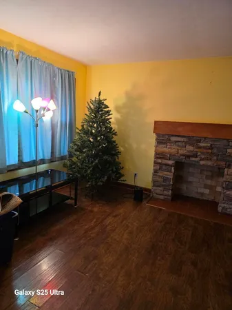 a view of a balcony with chairs and a table
