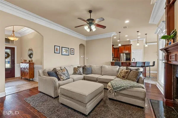 a large kitchen with a table and chairs