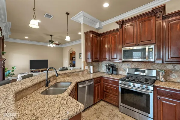 a bathroom with a bathtub and a window