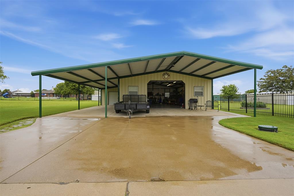 2732 Rawhide Court Haslet, TX 76052 - Photo 35 of 40 Front view of large shop with front covered parking