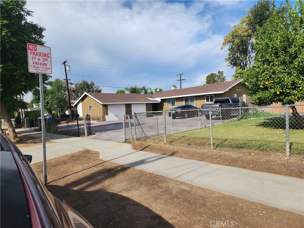 5121 Sierra Street Riverside, CA 92504 - Photo 1 of 34 a house with yard in front of it