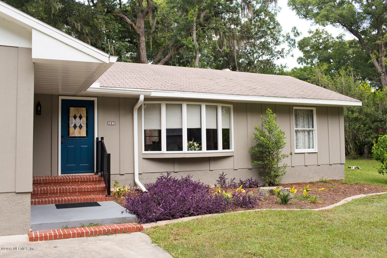 107 Saturn Road St. Augustine, FL 32086 - Photo 3 of 37 a front view of a house with garden