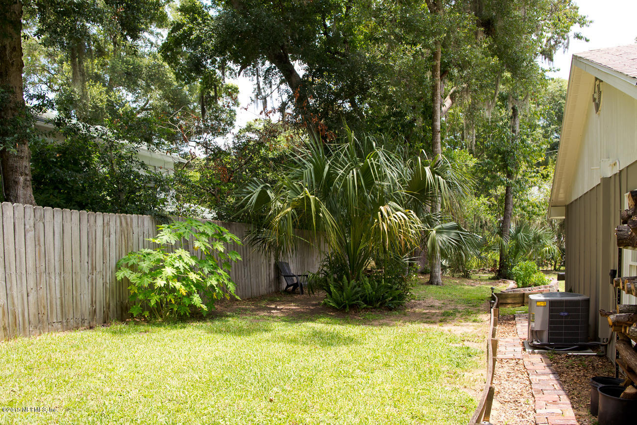 107 Saturn Road St. Augustine, FL 32086 - Photo 7 of 37 a view of backyard with patio