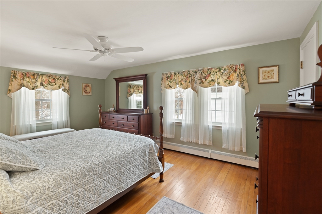 35 Longfellow Road Reading, MA 01867 - Photo 19 of 34 a bedroom with a large bed and a window