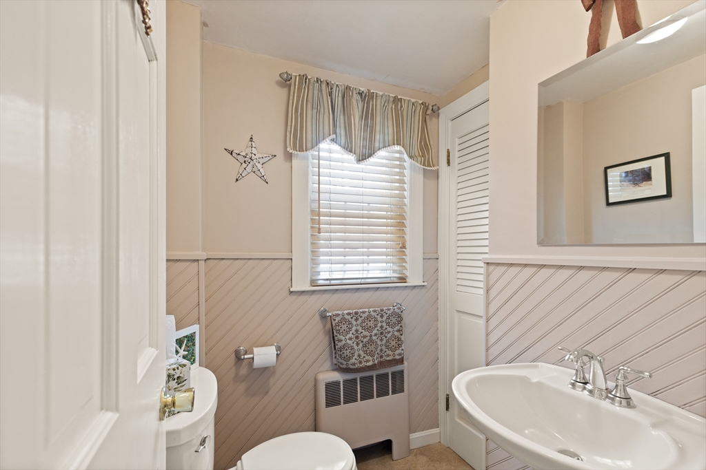 35 Longfellow Road Reading, MA 01867 - Photo 26 of 34 a bathroom with a sink toilet and shower