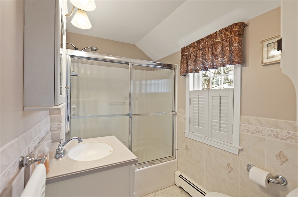 35 Longfellow Road Reading, MA 01867 - Photo 27 of 34 a bathroom with a sink and a mirror