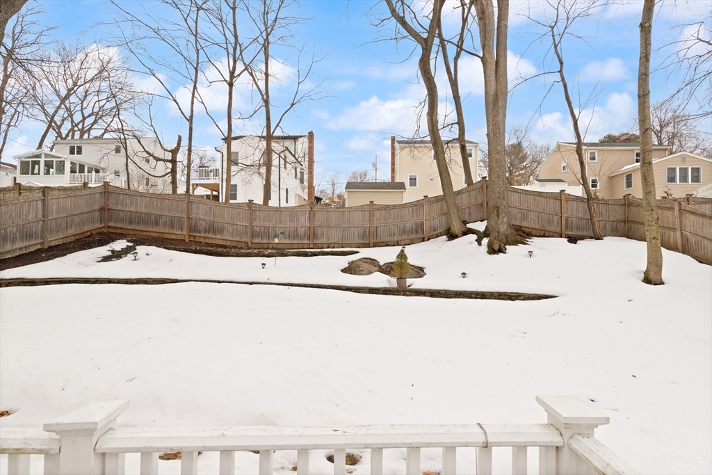 35 Longfellow Road Reading, MA 01867 - Photo 30 of 34 a view of swimming pool with a yard
