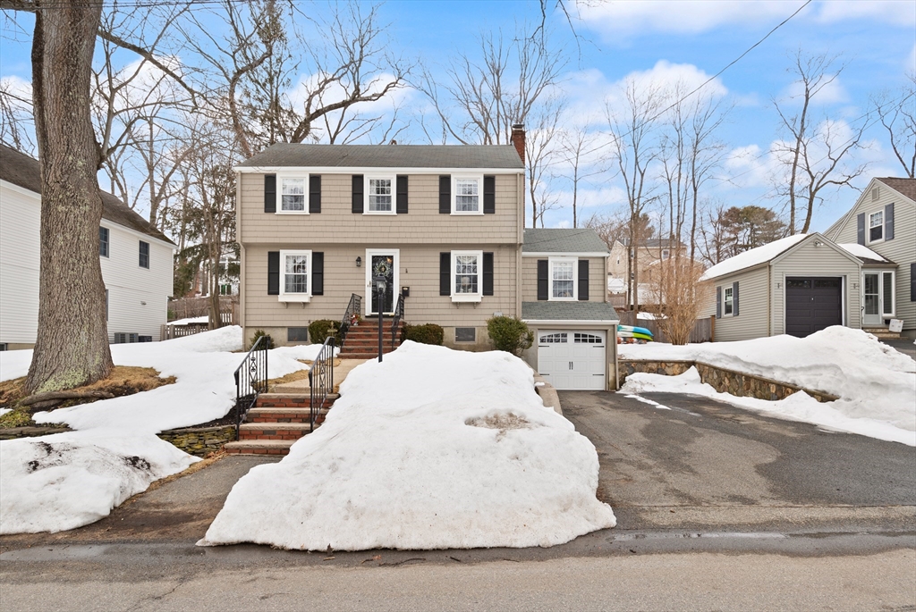 35 Longfellow Road Reading, MA 01867 - Photo 3 of 34 a white house that has tree in front of it
