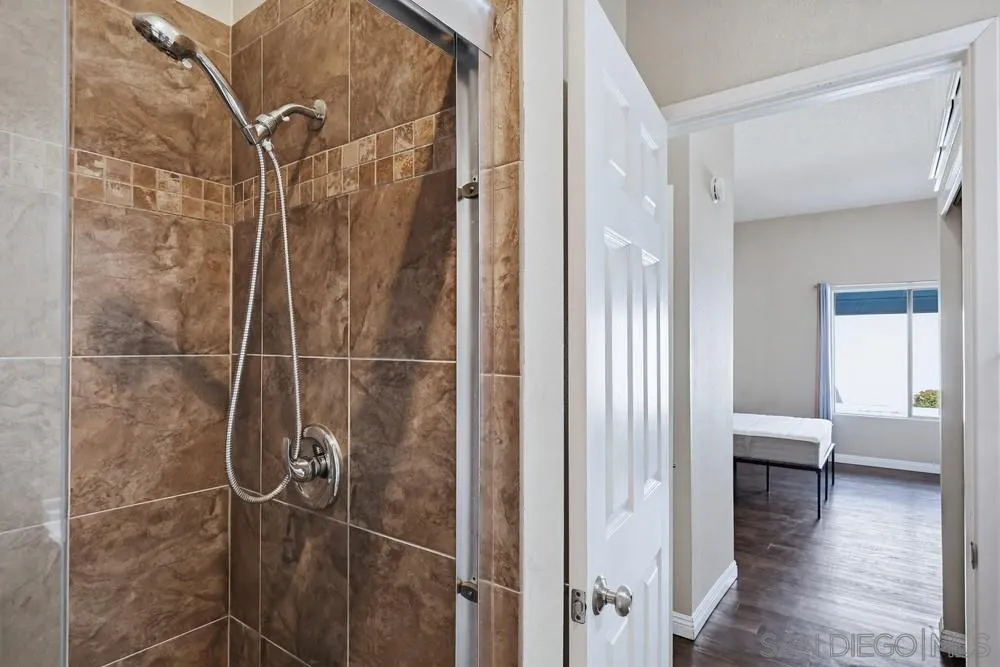 8324 Regents Road, Unit 2E San Diego, CA 92122 - Photo 21 of 31 a bathroom with a shower