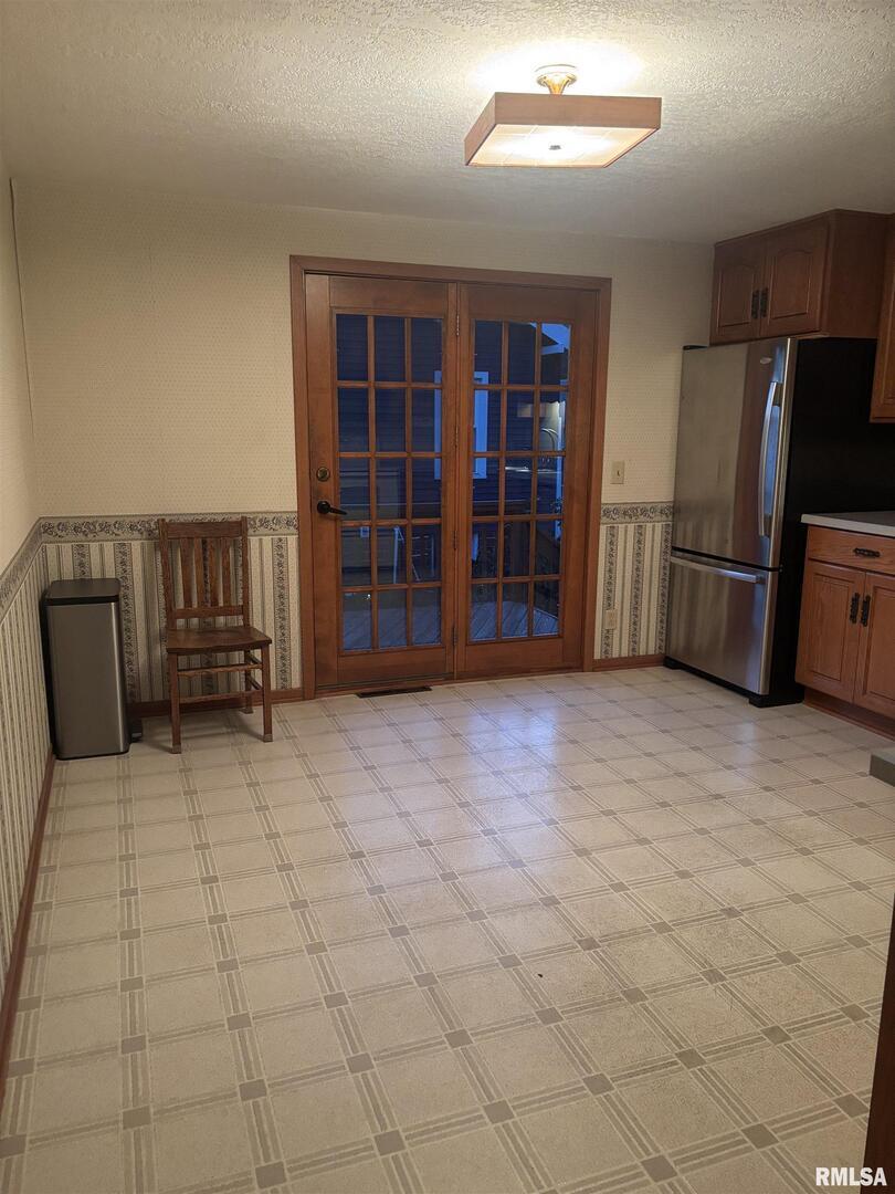 418 East Division Street Kewanee, IL 61443 - Photo 14 of 72 a view of kitchen with refrigerator and cabinets